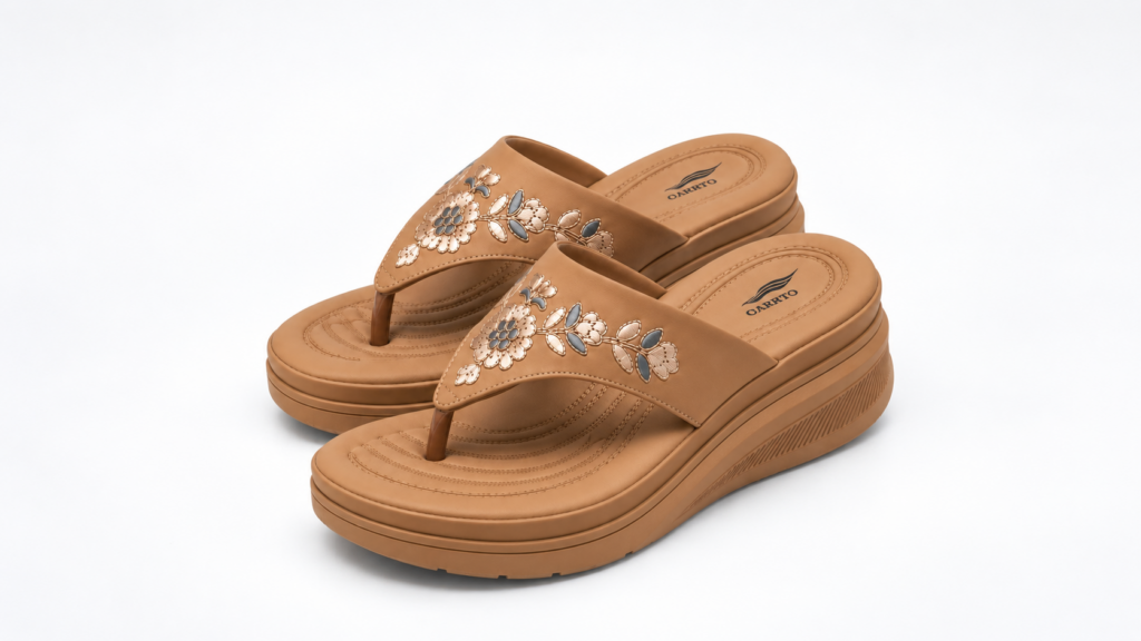 Side view of tan Carrito floral wedge sandals